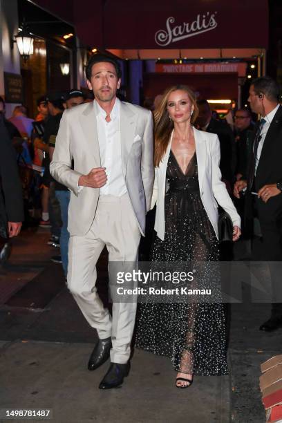 Adrien Brody and girlfriend Georgina Chapman seen at an 'Asteroid City' movie premiere after party at Sardi's restaurant in Manhattan on June 13,...