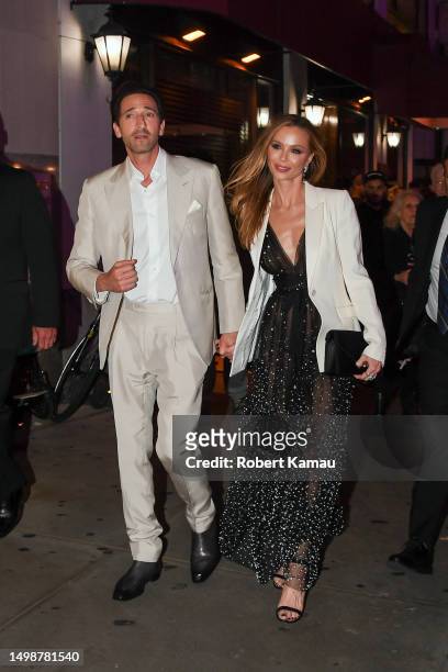 Adrien Brody and girlfriend Georgina Chapman seen at an 'Asteroid City' movie premiere after party at Sardi's restaurant in Manhattan on June 13,...
