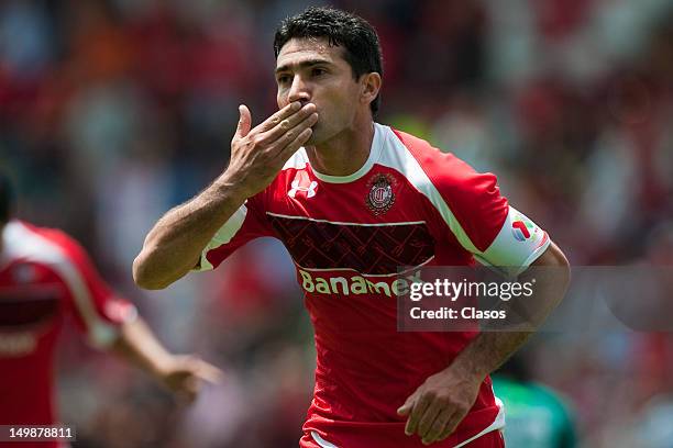 Antonio Naelson of Toluca celebrates a goal during a match between Toluca and Leon as part of the Torneo Apertura 2012 at Nemesio Diez Stadium on...