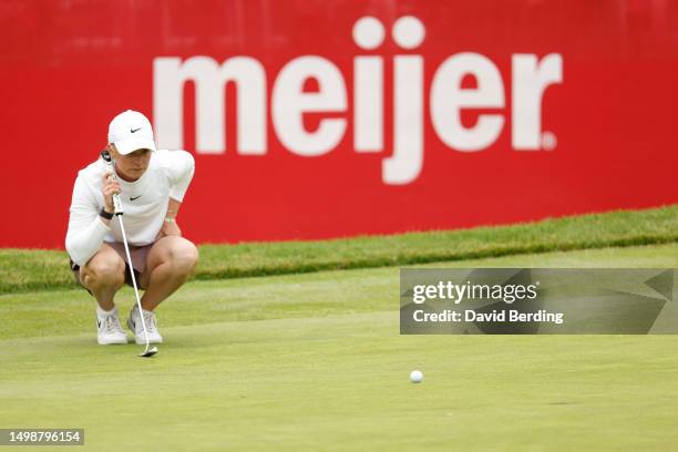 Frida Kinhult of Sweden lines up a putt on the 18th green during the first round of the Meijer LPGA Classic for Simply Give at Blythefield Country...