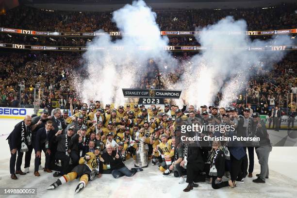 The Vegas Golden Knights pose with the Stanley Cup following their victory over the Florida Panthers in Game Five of the 2023 NHL Stanley Cup Final...