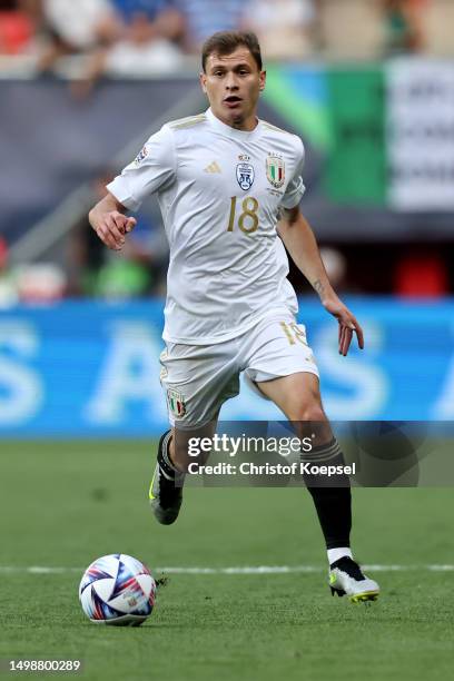 Nicolo Barella of Italy runs with the ball during the UEFA Nations League 2022/23 semifinal match between Spain and Italy at FC Twente Stadium on...