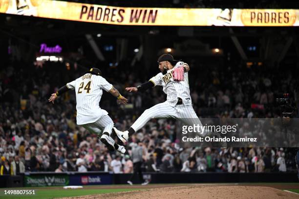 Fernando Tatis Jr. #23 and Rougned Odor of the San Diego Padres celebrate after defeating the Cleveland Guardians 5-0 at PETCO Park on June 14, 2023...
