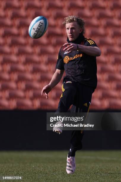 Chiefs Damian McKenzie kicks a ball during a media opportunity ahead of the Super Rugby Pacific semi final between the Chiefs and the Brumbies, at...