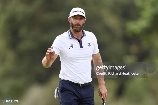 Dustin Johnson of the United States reacts to his putt on the seventh green during the first round of the 123rd U.S. Open Championship at The Los...