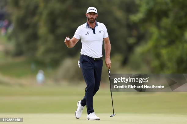 Dustin Johnson of the United States reacts to his putt on the seventh green during the first round of the 123rd U.S. Open Championship at The Los...