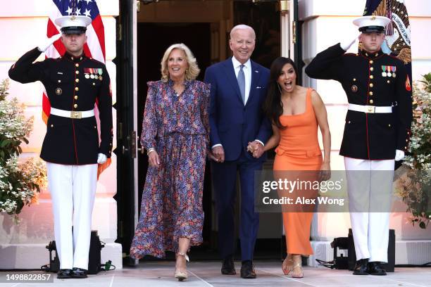 President Joe Biden, first lady Jill Biden and film director Eva Longoria arrive at a screening of the film “Flamin’ Hot” on the South Lawn of the...