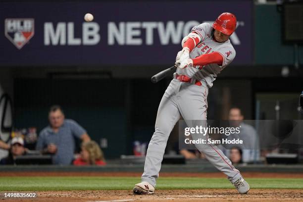 Shohei Ohtani of the Los Angeles Angels hits a two-run home run during the eighth inning against the Texas Rangers at Globe Life Field on June 15,...