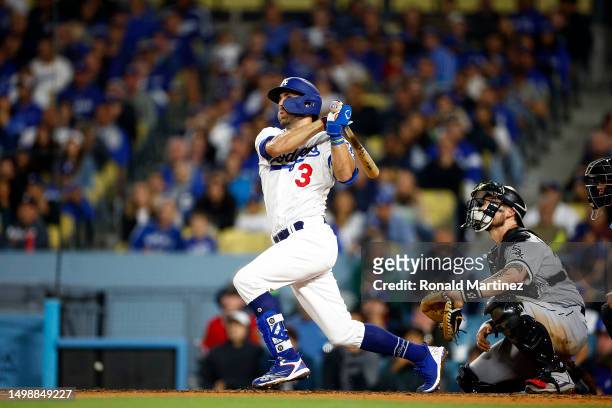 Chris Taylor of the Los Angeles Dodgers hits a grand slam against the Chicago White Sox in the sixth inning at Dodger Stadium on June 15, 2023 in Los...