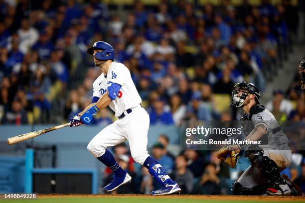 Chris Taylor of the Los Angeles Dodgers hits a grand slam against the Chicago White Sox in the sixth inning at Dodger Stadium on June 15, 2023 in Los...