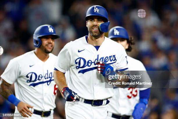 Chris Taylor of the Los Angeles Dodgers celebrates his 100th MLB career home run a grand slam against the Chicago White Sox in the sixth inning at...