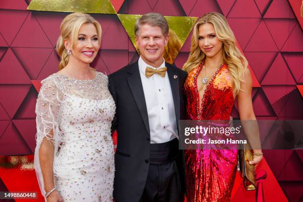 Clark Hunt with his wife Tavia Shackles and daughter Gracie Hunt walking the red carpet at the Kansas City Chiefs ring ceremony at Union Station on...