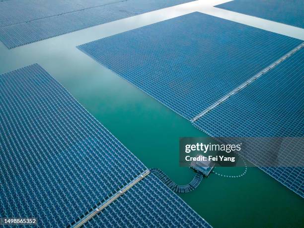 floating solar power station - science fiction stock pictures, royalty-free photos & images