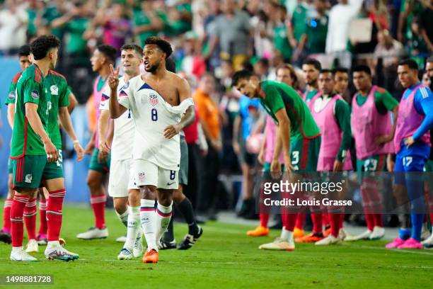 Weston Mckennie of USA displays a peace sign to Jorge Sanchez of Mexico following the scuffle during the second half during the 2023 CONCACAF Nations...