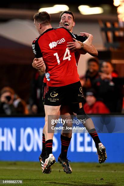 Will Jordan celebrates with Dallas McLeod of the Crusaders after scoring a try during the Super Rugby Pacific Semi Final match between Crusaders and...