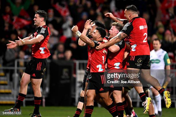 The Crusaders celebrate a try scored by Leicester Fainga'anuku during the Super Rugby Pacific Semi Final match between Crusaders and Blues at...