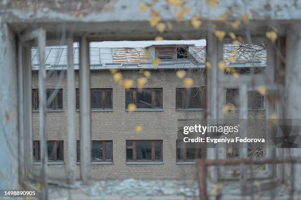 broken window in a dilapidated old building - pounce attack stock pictures, royalty-free photos & images