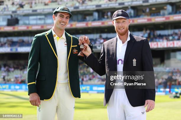 Pat Cummins of Australia and Ben Stokes of England poses for a photo with the The Ashes urn prior to Day One of the LV= Insurance Ashes 1st Test...