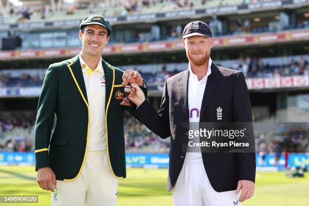 Pat Cummins of Australia and Ben Stokes of England poses for a photo with the The Ashes urn prior to Day One of the LV= Insurance Ashes 1st Test...