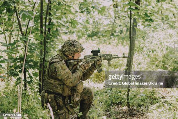 Ukrainian soldier holds his weapon during training on June 1, 2023 in Donetsk Oblast, Ukraine. Ukrainian soldiers are preparing for a military...