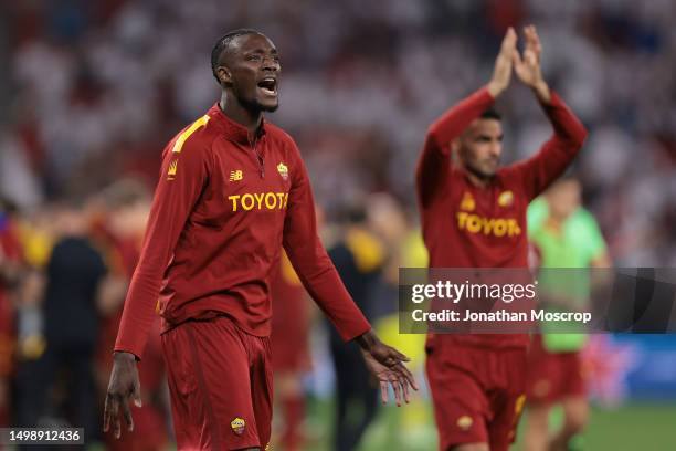 Tammy Abraham and Mehmet Celik of AS Roma encourage fans to get behind the team prior to the start of extra time in the UEFA Europa League 2022/23...