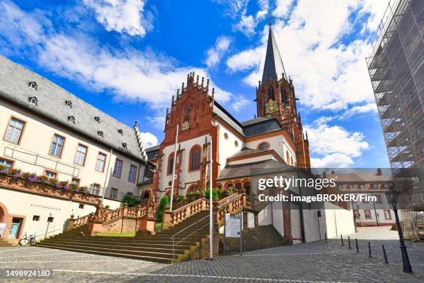 aschaffenburg, germany, july 2020 catholic curch called 'kollegiatsstift st. peter und alexander' or 'stiftskirche' or 'basilica of st. peter and alexande' in historic city center on sunny day - aschaffenburg stock pictures, royalty-free photos & images