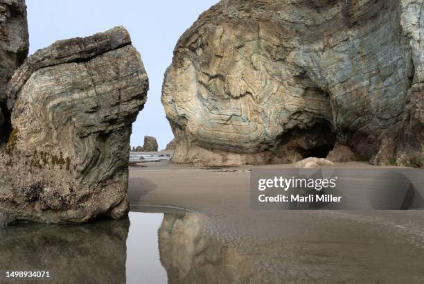 folded jurassic radiolarian chert and sea stacks--part of the accreted franciscan assemblage of southwestern oregon - radiolaria stock pictures, royalty-free photos & images