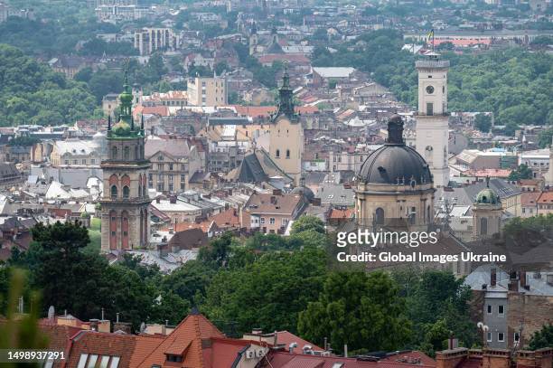 General view of historical buildings of Rynok Square and tower of the Town Hall, the Latin, the Dominican and the Assumption Cathedrals on June 14,...