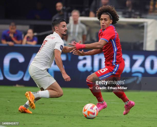 Adalberto Carrasquilla of Panama dribbles the ball against Stephen Eustaquio of Canada in the first half of their game during the 2023 CONCACAF...