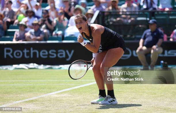 Jodie Burrage of Great Britain celebrates after she beats Magdalena Frech of Poland during the Rothesay Open at Nottingham Tennis Centre on June 16,...