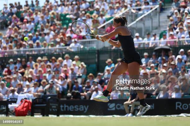 Jodie Burrage of Great Britain plays against Magdalena Frech of Poland during the Rothesay Open at Nottingham Tennis Centre on June 16, 2023 in...
