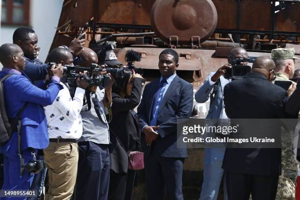 Members of African countries leaders' delegation, surrounded by Ukrainian and their own journalists, look at destroyed Russian equipment, exhibited...