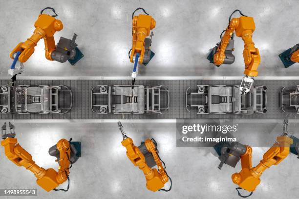 industrial robots at the automatic car manufacturing factory assembly line - digital twin stock pictures, royalty-free photos & images