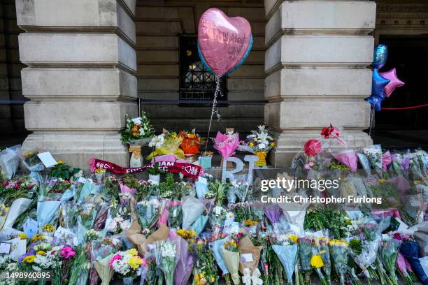 Flowers, balloons and tributes lay on the steps of Nottingham Council House after three people were killed and another three hurt in Tuesday's...