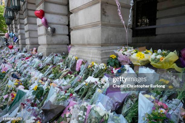 Flowers, balloons and tributes lay on the steps of Nottingham Council House after three people were killed and another three hurt in Tuesday's...