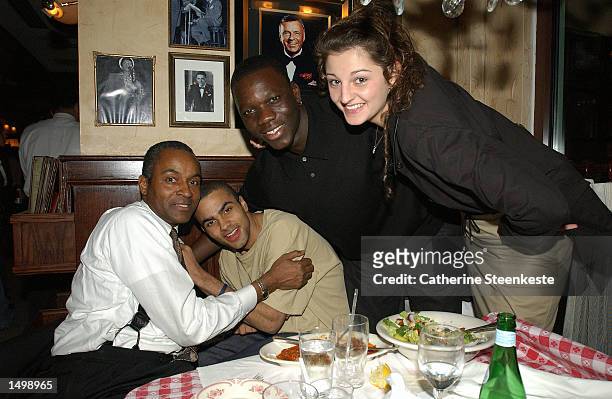 Tony Parker jokes around with his dad Tony Parker senior, Bah-Pna from Nike France and his girlfriend Lorianne at a dinner during the NBA All Star...