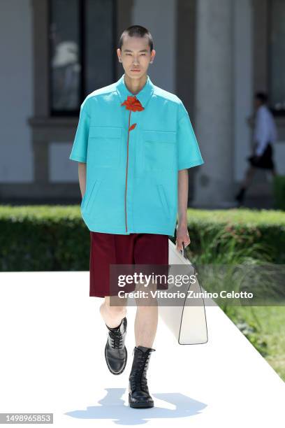 Model walks the runway at the Valentino Spring/Summer 2024 fashion show during the Milan Fashion Week menswear spring/summer 2024 on June 16, 2023 in...