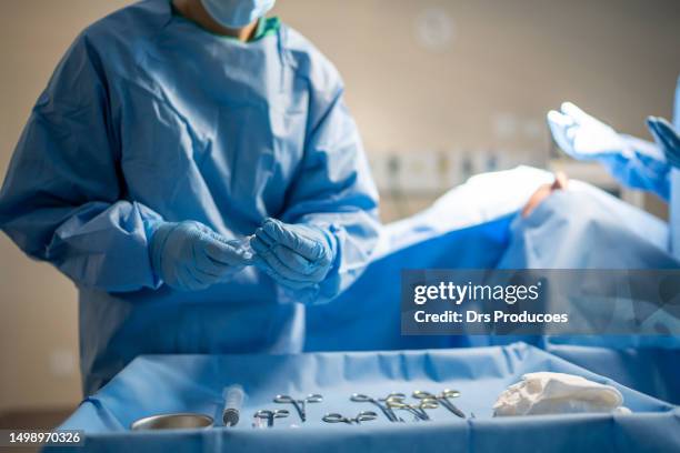 surgical instrument table - operating stock pictures, royalty-free photos & images