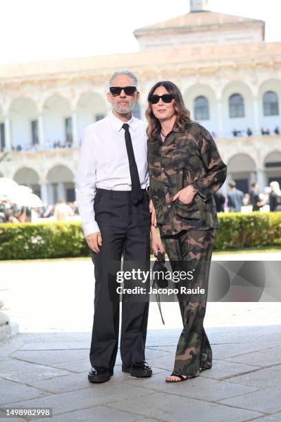 Beppe Fiorello and Eleonora Pratelli are seen arriving at the Valentino Spring/Summer 2024 fashion show during the Milan Fashion Week menswear...