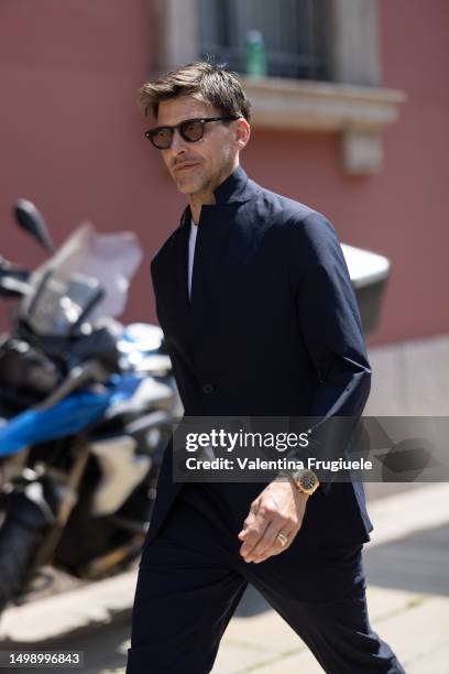 Johannes Huebl is seen wearing a blue suit and gold watch outside Valentino show during the Milan Fashion Week - Menswear Spring/Summer 2024 on June...