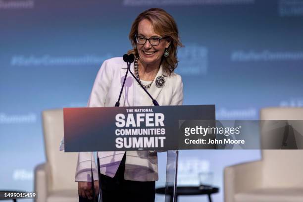 Gun control advocate and former U.S. Rep. Gabby Giffords speaks during the National Safer Communities Summit at the University of Hartford on June...