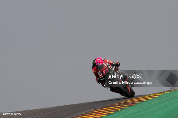 Aleix Espargaro of Spain and Aprilia Racing rounds the bend during the MotoGP of Germany - Free Practice at Sachsenring Circuit on June 16, 2023 in...