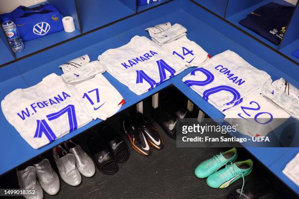 The kits of Wesley Fofana, Boubacar Kamara and Kingsley Coman of France are displayed inside the dressing room prior to the UEFA EURO 2024 qualifying...