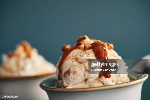 caramel ice cream with topping - caramel sauce stock pictures, royalty-free photos & images