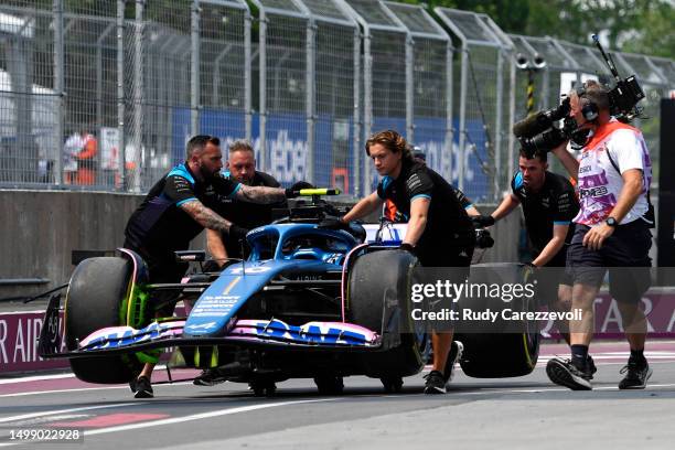 The car of Pierre Gasly of France and Alpine F1 is recovered to the garage after stopping on track during practice ahead of the F1 Grand Prix of...