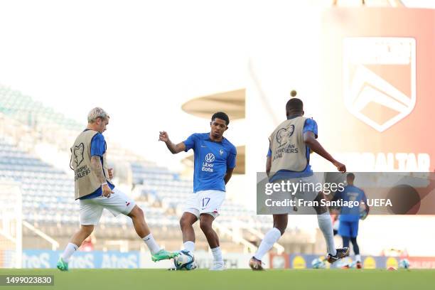 Wesley Fofana of France warms up with teammates prior to the UEFA EURO 2024 qualifying round group B match between Gibraltar and France at Estadio...