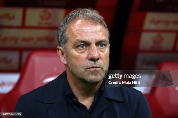 Hansi Flick, Head Coach of Germany looks on prior to the international friendly match between Poland and Germany at Stadion Narodowy on June 16, 2023...