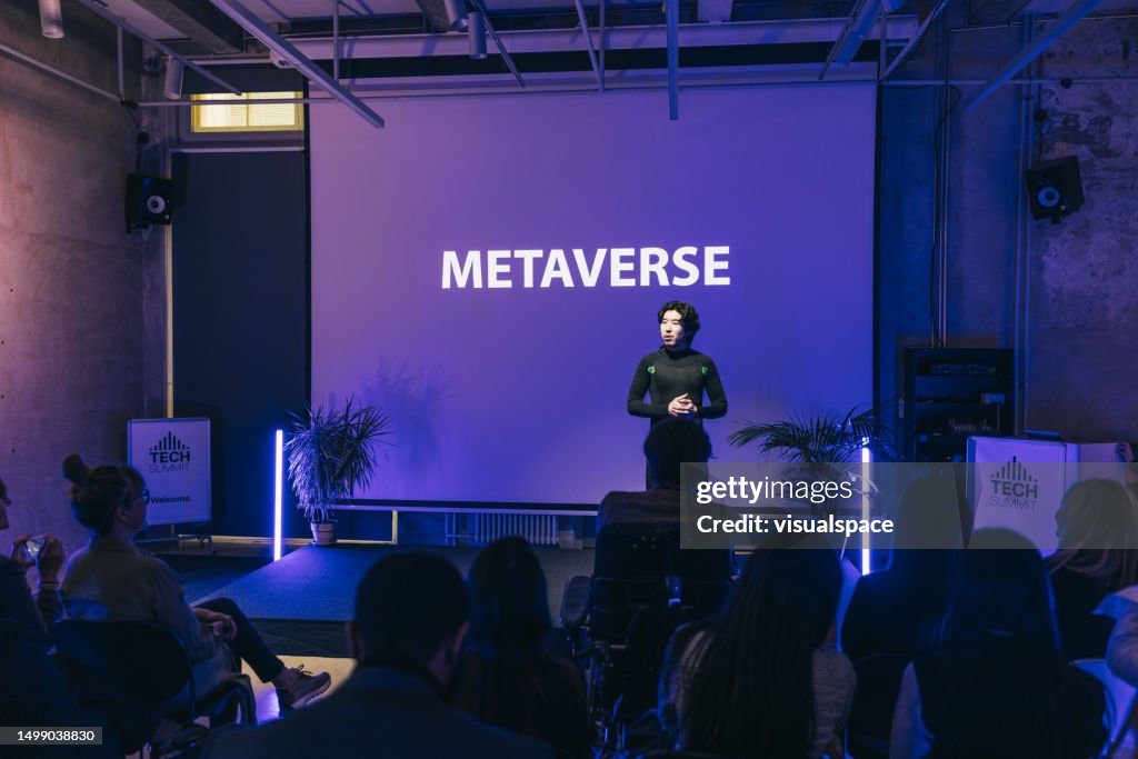 Japanese businessman making a presentation on virtual reality and metaverse