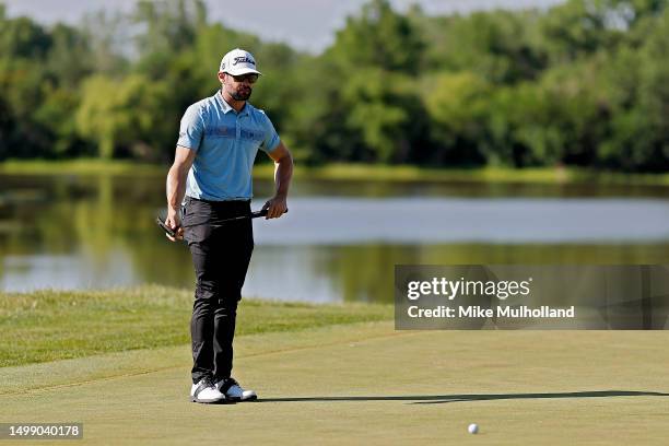 Kyle Stanley of the United States looks over a putt on the fourth hole during the second round of the Blue Cross and Blue Shield of Kansas Wichita...