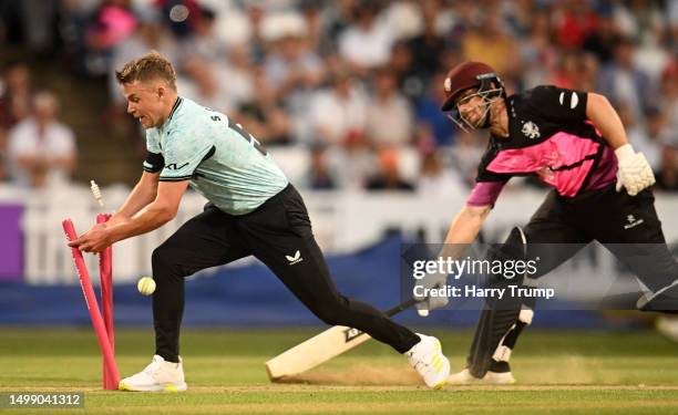 Sean Dickson of Somerset is run out by Sam Curran of Surrey during the Vitality Blast T20 match between Somerset and Surrey at The Cooper Associates...